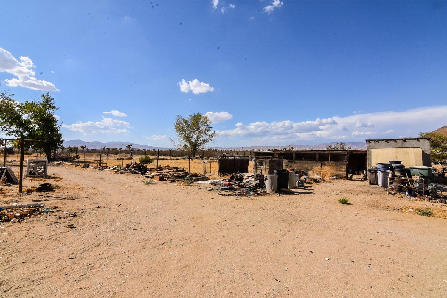 4355 Backus Road Mojave, CA 93501 - Photo 10 of 25 a view of a road with a bike and cars