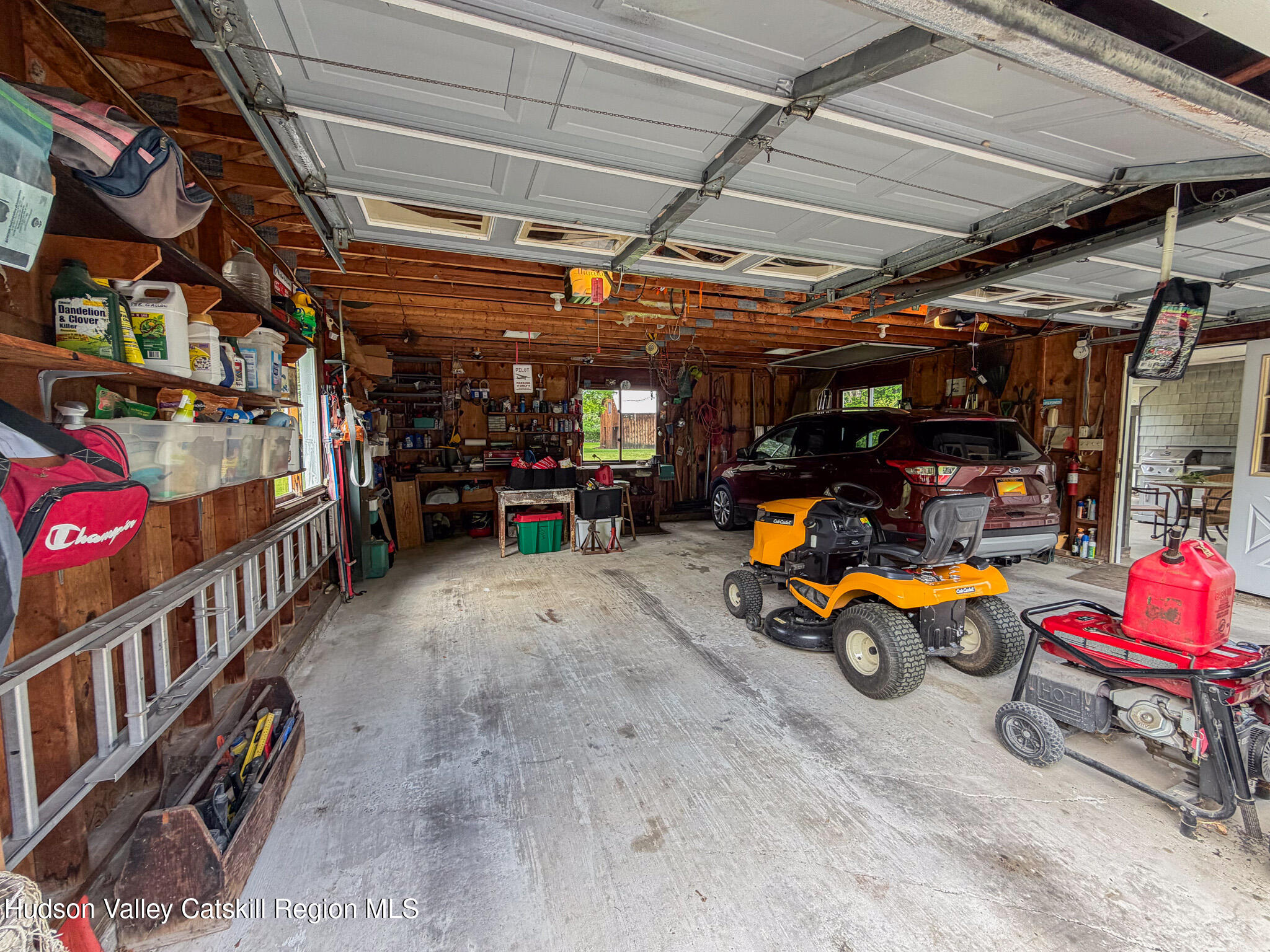 221 Camp Medusa Road Rensselaerville, NY 12120 - Photo 23 of 57 a view of parking garage with cars