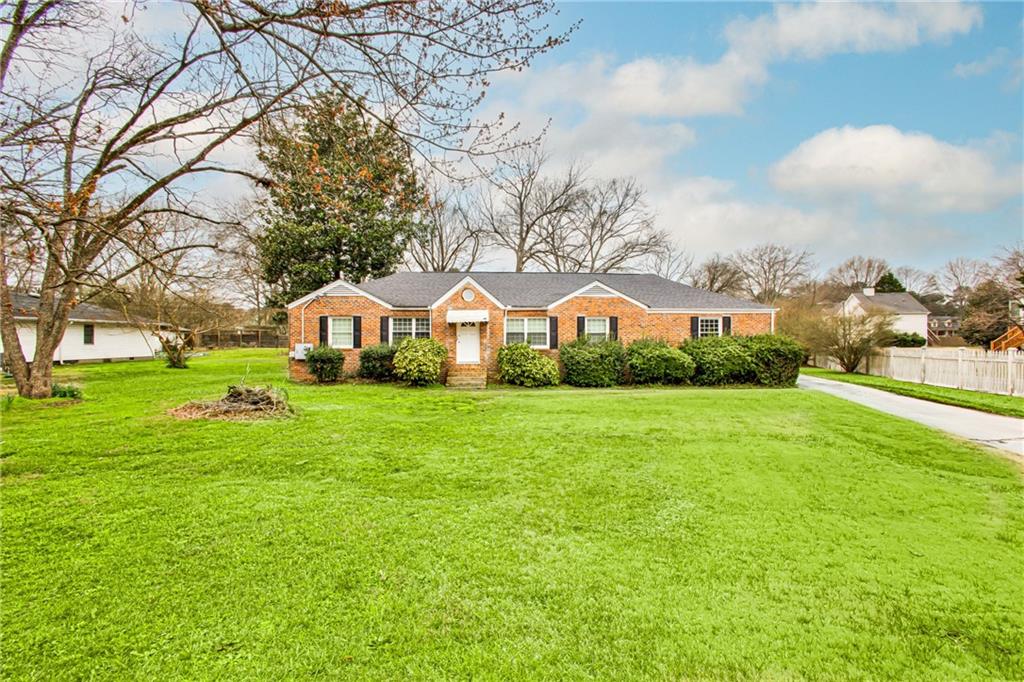 2880 Old Lost Mountain Road, Unit A Powder Springs, GA 30127 - Photo 1 of 23 a view of a house with a yard