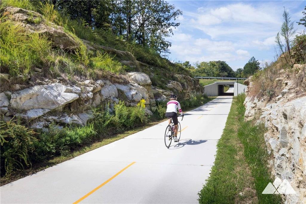 2880 Old Lost Mountain Road, Unit A Powder Springs, GA 30127 - Photo 23 of 23 a view of a park with plants and a bench