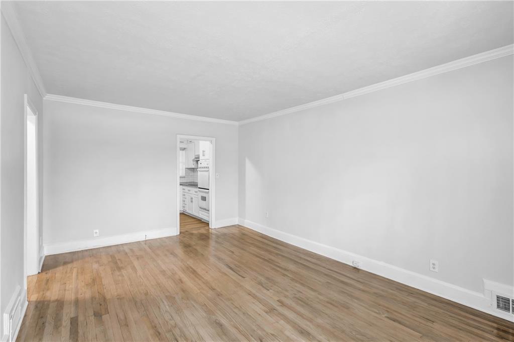 2880 Old Lost Mountain Road, Unit A Powder Springs, GA 30127 - Photo 3 of 23 a view of an empty room with wooden floor
