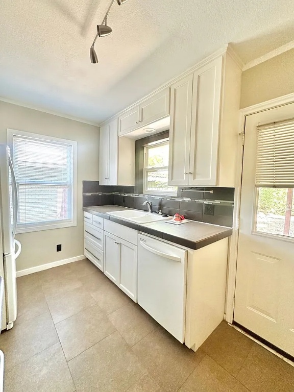 2712 Windsor Road Austin, TX 78703 - Photo 3 of 10 a large bathroom with a granite countertop sink and a mirror