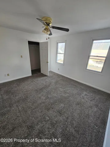 a view of kitchen with furniture and window