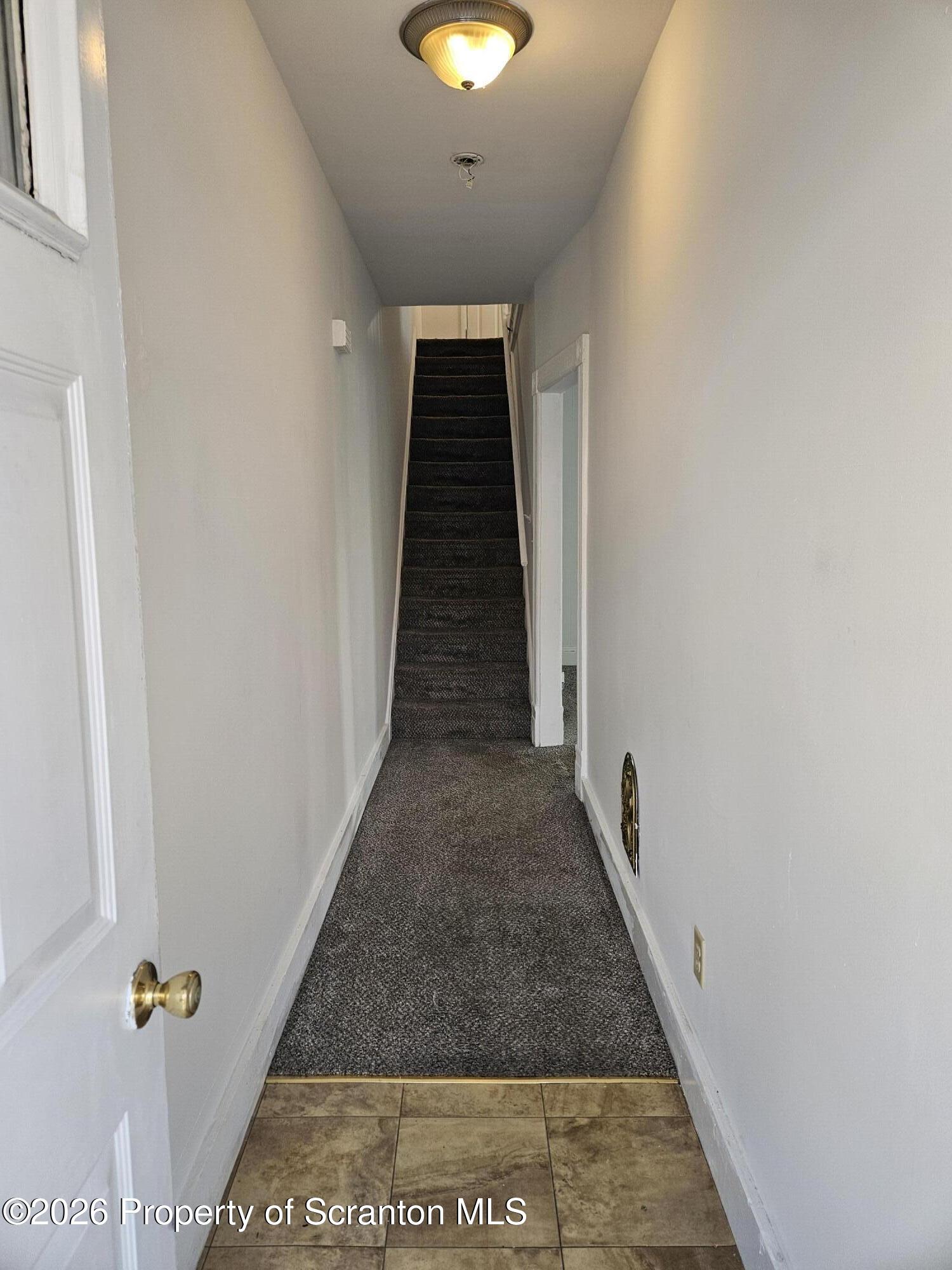 1044 John Avenue Scranton, PA 18510 - Photo 7 of 28 a view of a hallway with wooden floor and entryway