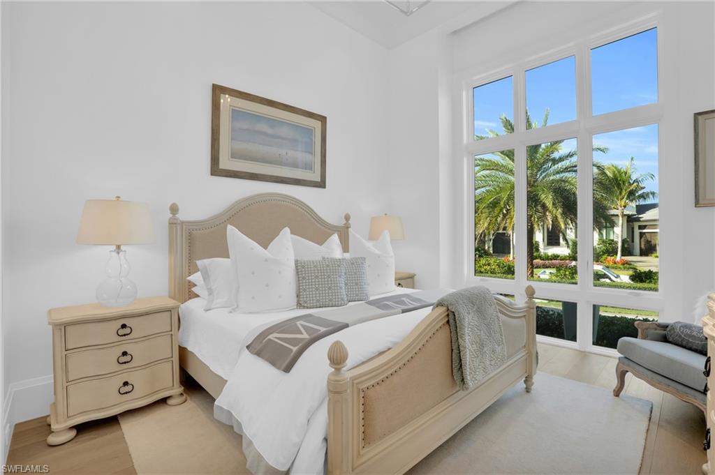 3110 Leeward Lane Naples, FL 34103 - Photo 29 of 50 a bed room with a bed and a window