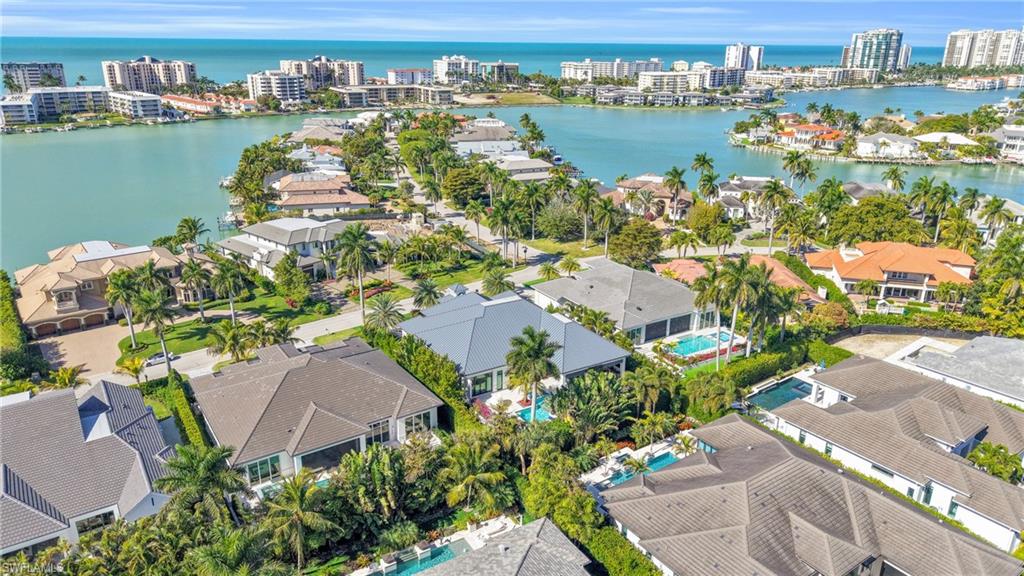 3110 Leeward Lane Naples, FL 34103 - Photo 50 of 50 an aerial view of residential houses with outdoor space