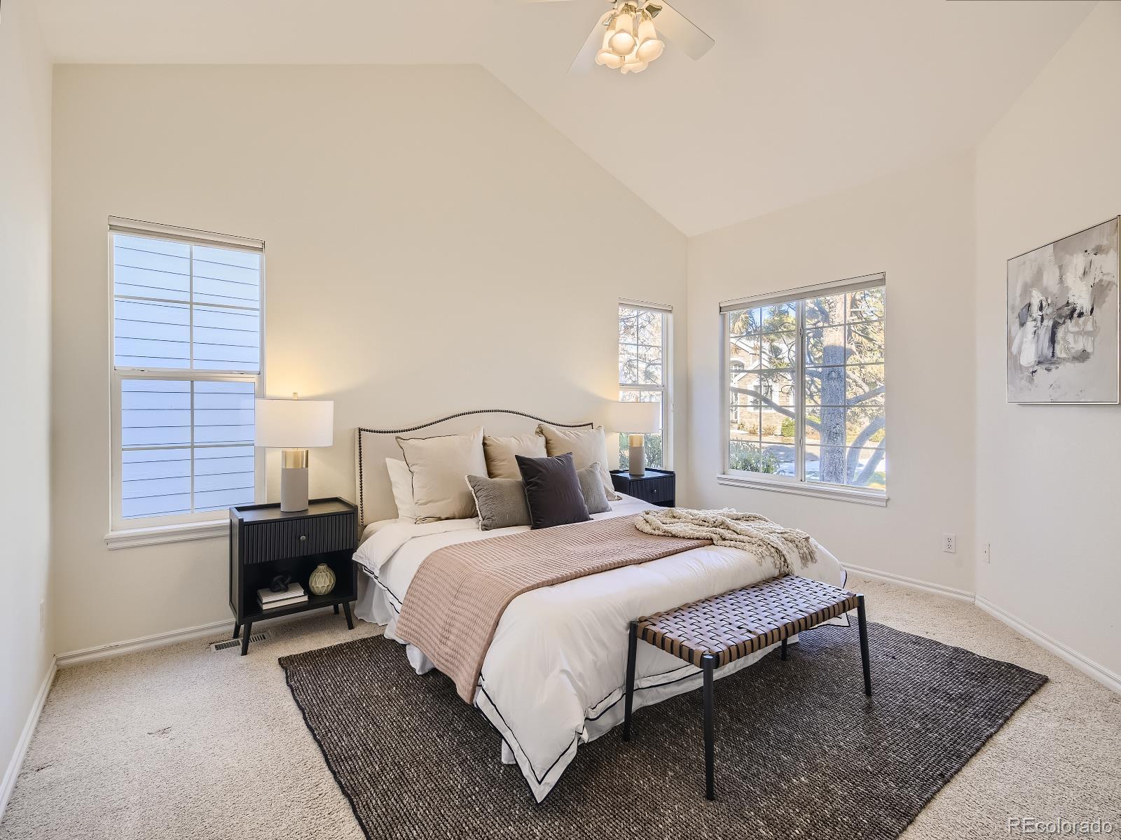 7400 West Grant Ranch Boulevard, Unit 60 Denver, CO 80123 - Photo 12 of 36 a bedroom with bed and a window