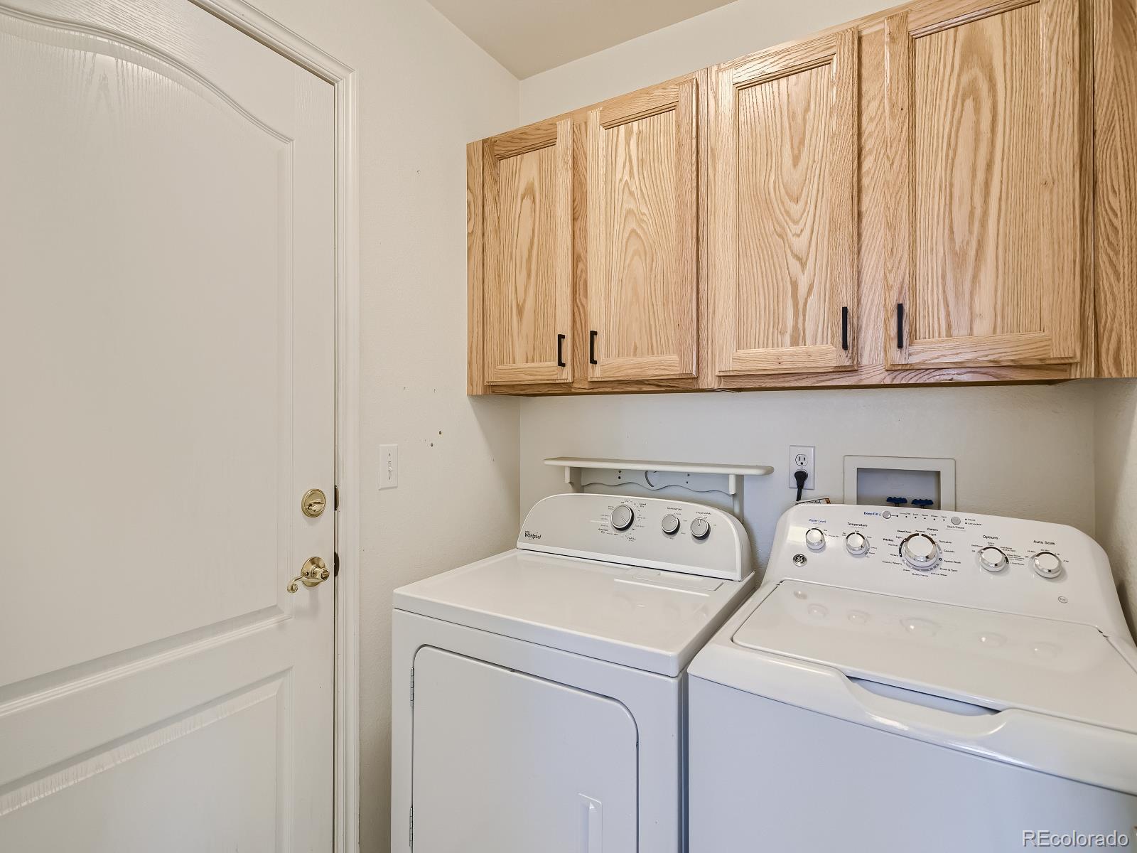 7400 West Grant Ranch Boulevard, Unit 60 Denver, CO 80123 - Photo 19 of 36 a utility room with dryer and washer