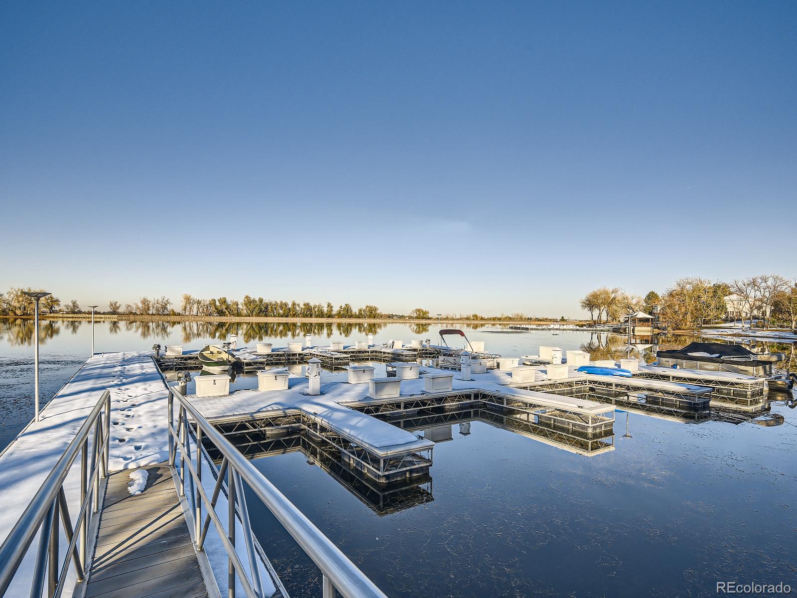 7400 West Grant Ranch Boulevard, Unit 60 Denver, CO 80123 - Photo 31 of 36 a view of a terrace with lawn chairs