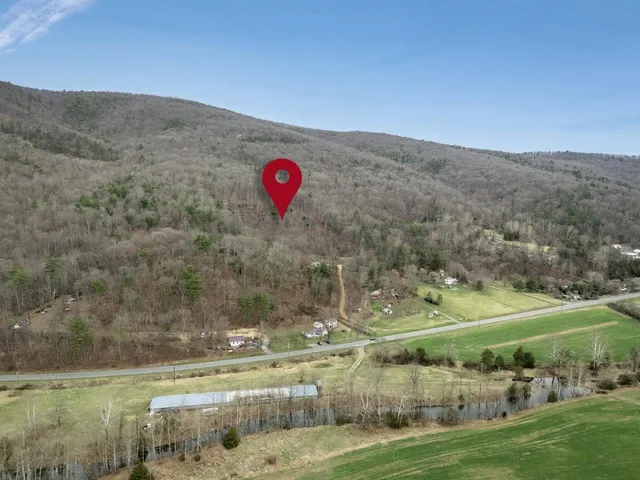 a view of an ocean and mountain