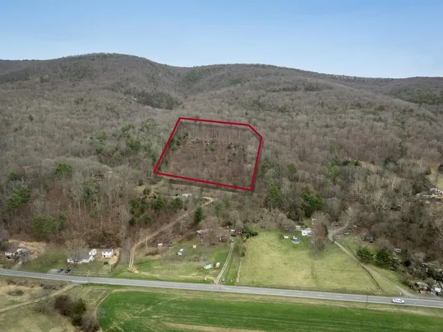 a view of a town with mountains