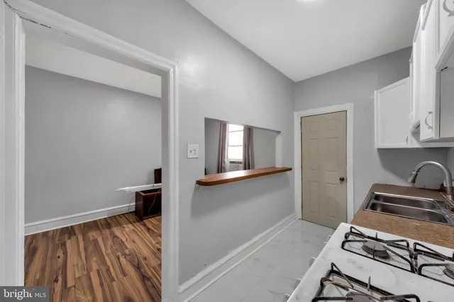 a view of kitchen and utility room