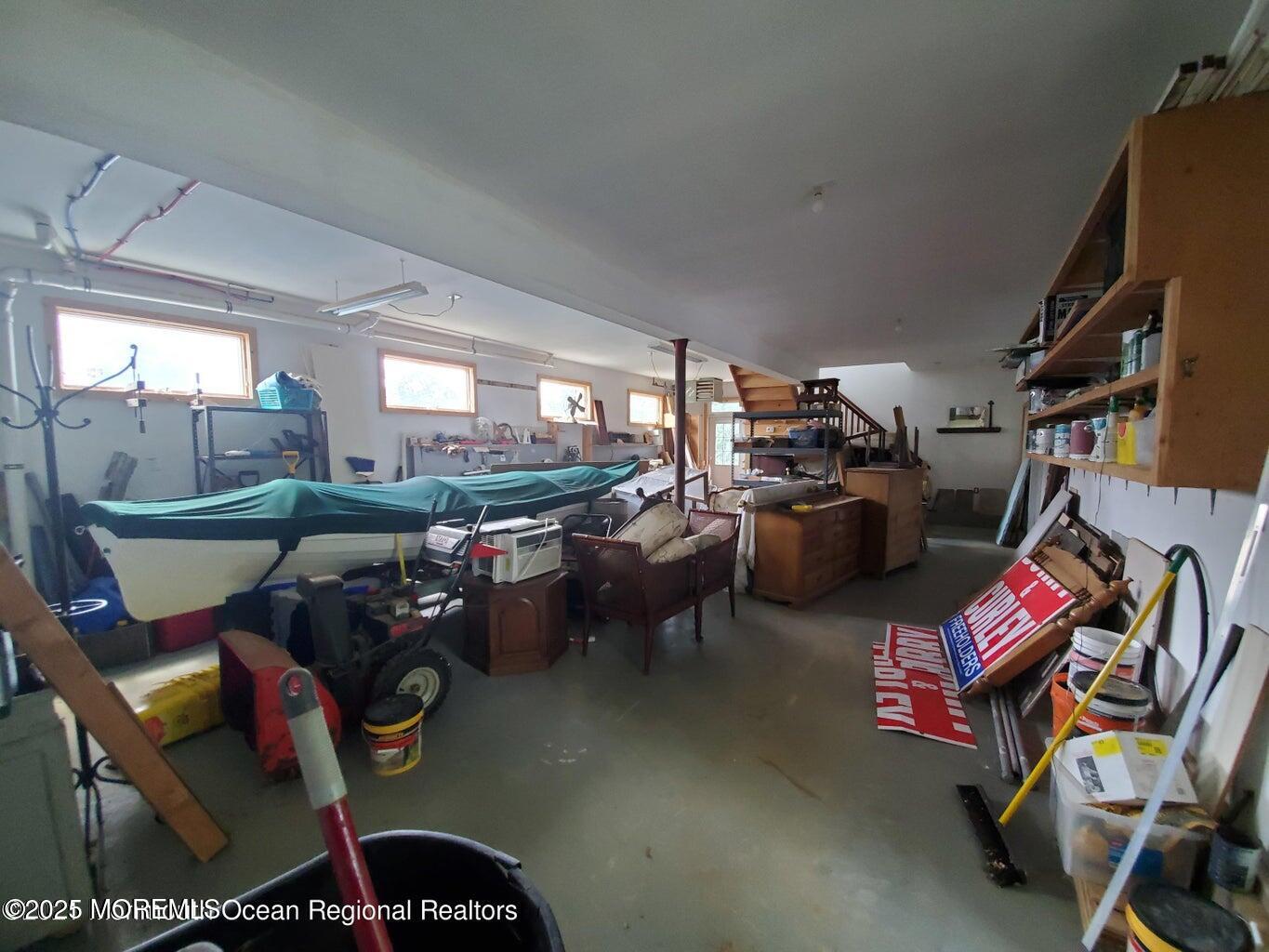 92 Compton Street Belford, NJ 07718 - Photo 13 of 27 a view of a room with gym equipment