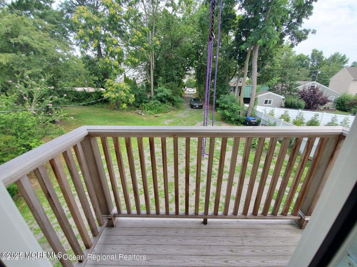 92 Compton Street Belford, NJ 07718 - Photo 19 of 27 a view of a wooden fence
