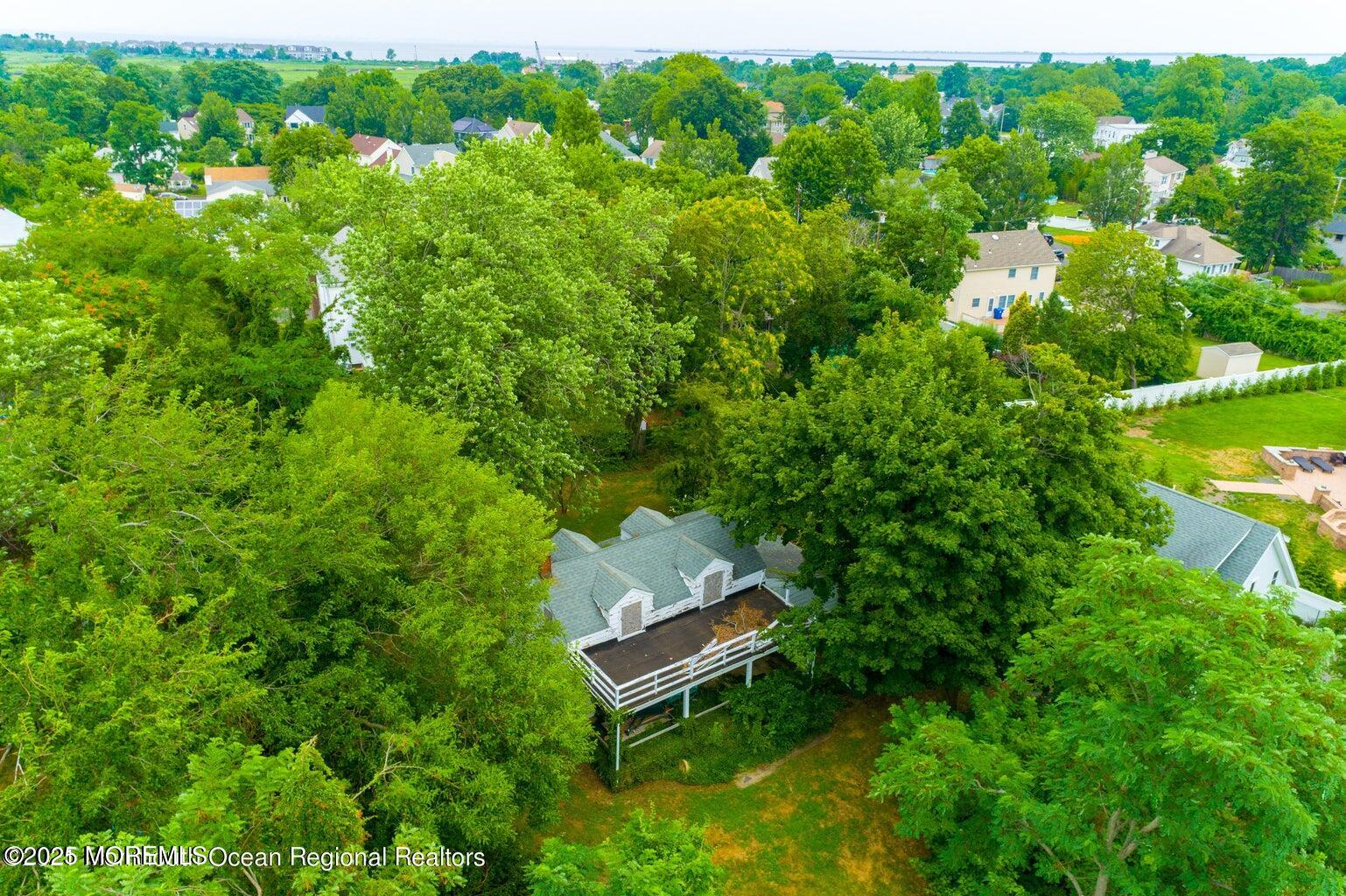 92 Compton Street Belford, NJ 07718 - Photo 23 of 27 an aerial view of a house with a yard
