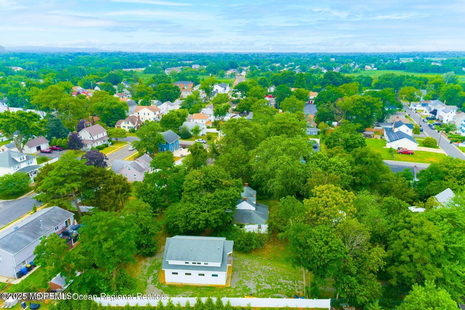 92 Compton Street Belford, NJ 07718 - Photo 24 of 27 a view of a bunch of trees and bushes