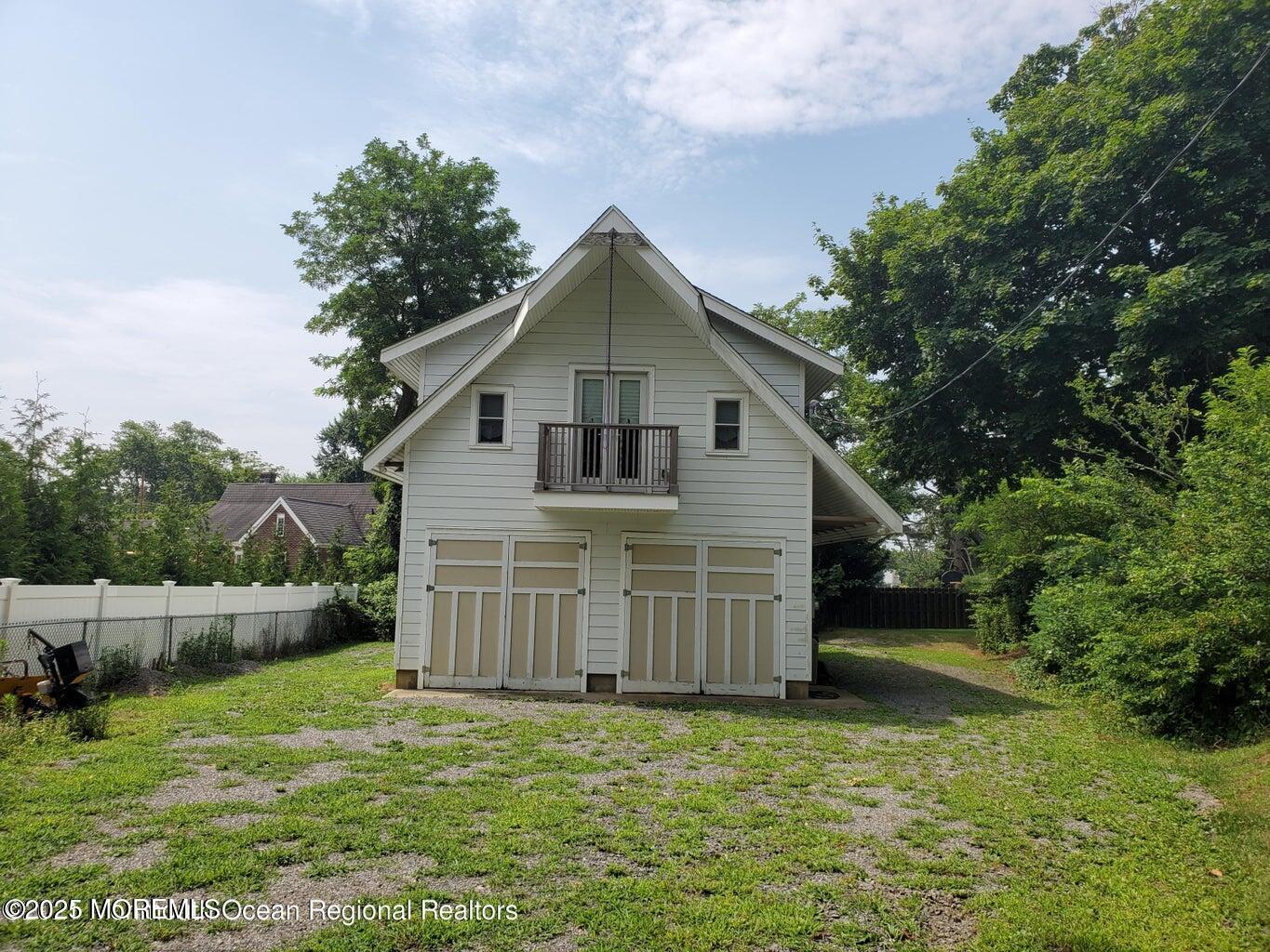 92 Compton Street Belford, NJ 07718 - Photo 3 of 27 a view of a house with a yard