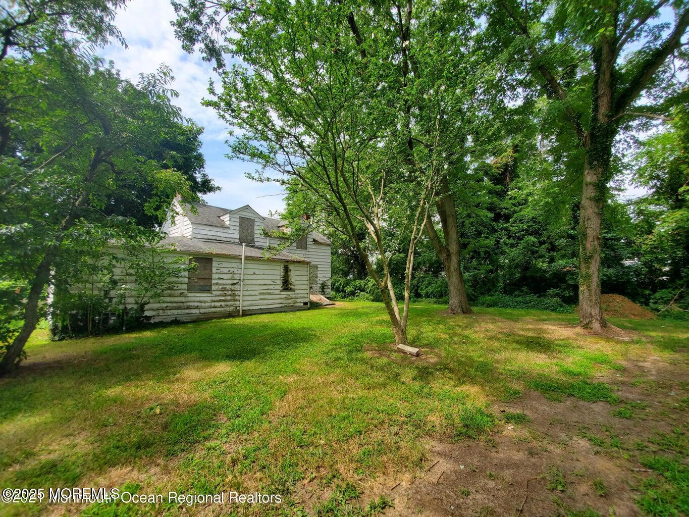 92 Compton Street Belford, NJ 07718 - Photo 4 of 27 a view of a backyard