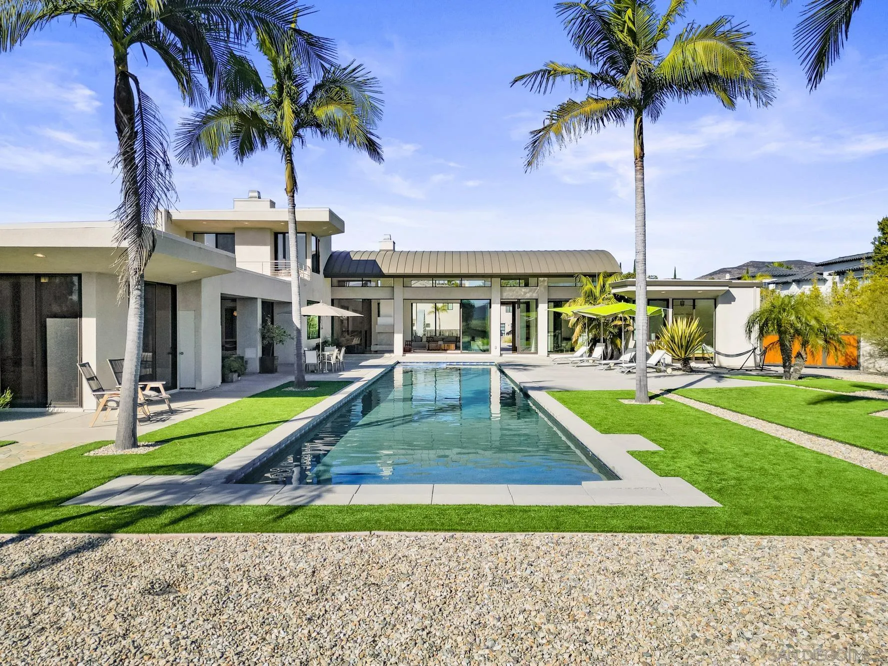 2844 Gate 2 Place Chula Vista, CA 91914 - Photo 1 of 65 a swimming pool with outdoor seating and yard