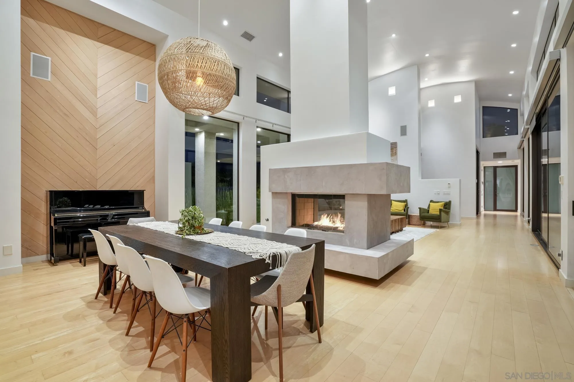 2844 Gate 2 Place Chula Vista, CA 91914 - Photo 11 of 65 a view of a dining room with furniture and a fireplace