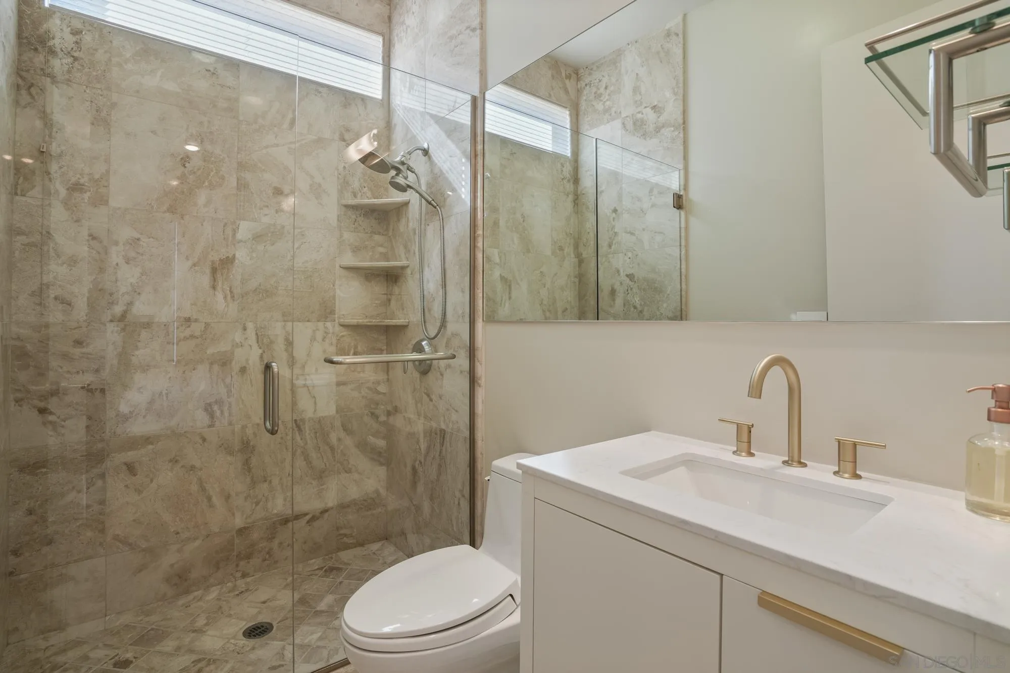 2844 Gate 2 Place Chula Vista, CA 91914 - Photo 31 of 65 a bathroom with a sink toilet and shower