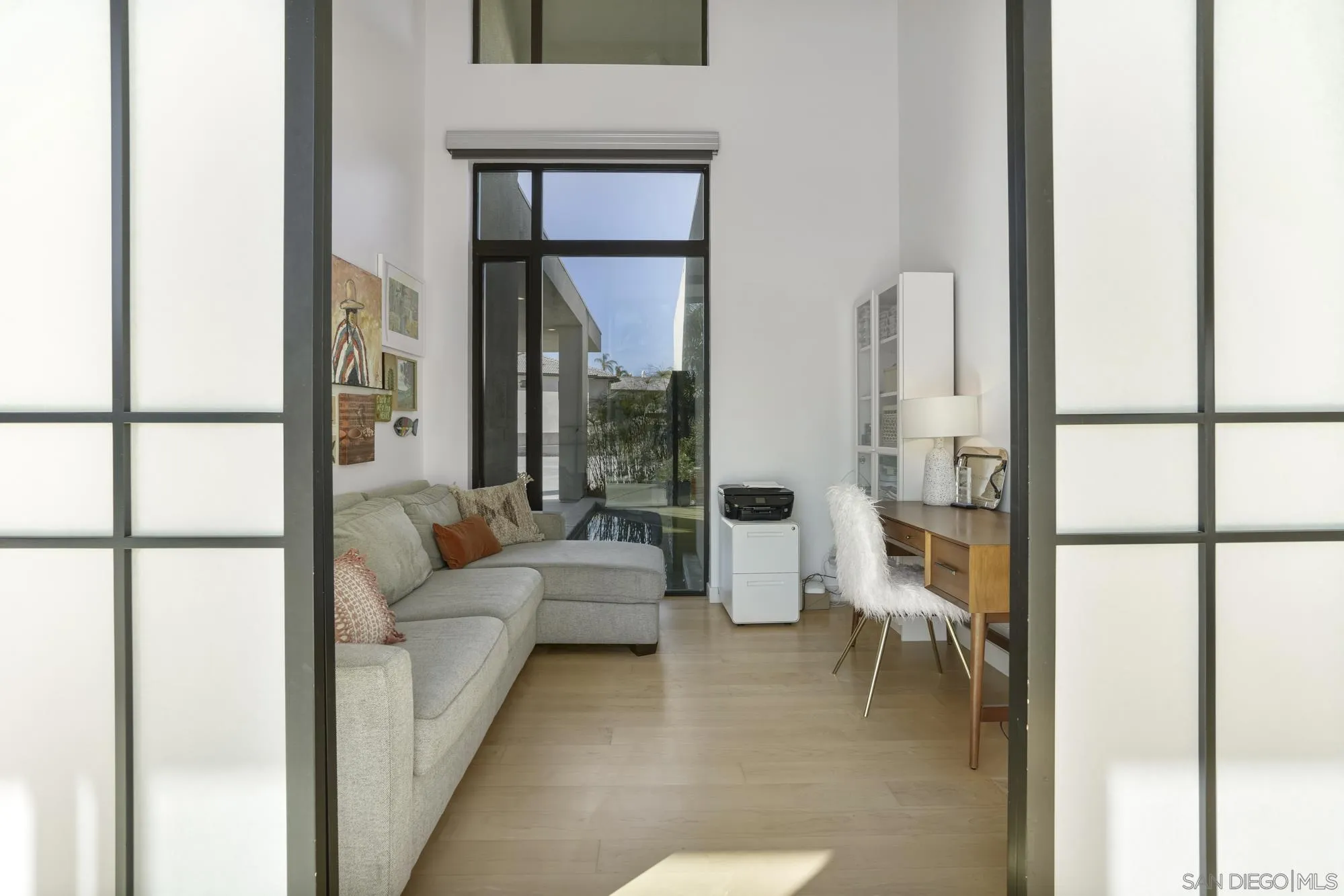 2844 Gate 2 Place Chula Vista, CA 91914 - Photo 37 of 65 a living room with furniture and a large window