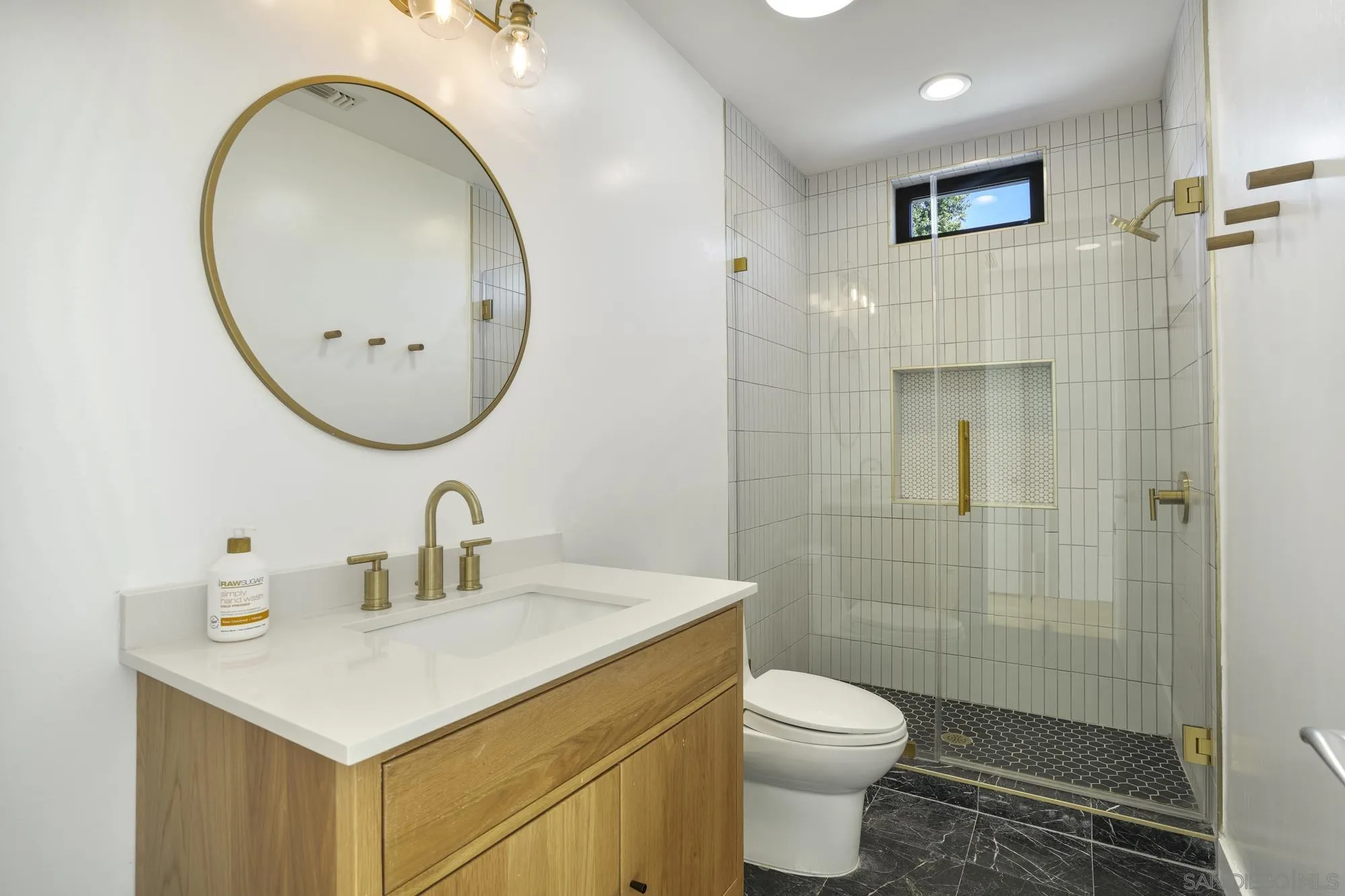 2844 Gate 2 Place Chula Vista, CA 91914 - Photo 40 of 65 a bathroom with a sink toilet and shower