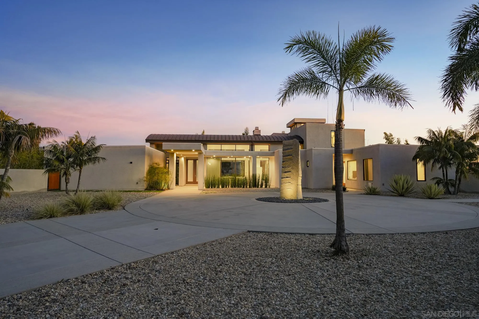 2844 Gate 2 Place Chula Vista, CA 91914 - Photo 56 of 65 a front view of a house with a yard and garage