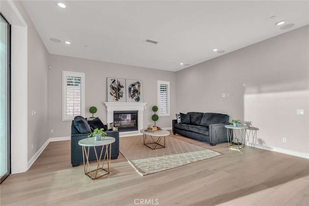 112 Clear Falls Irvine, CA 92602 - Photo 25 of 62 a living room with furniture and a table