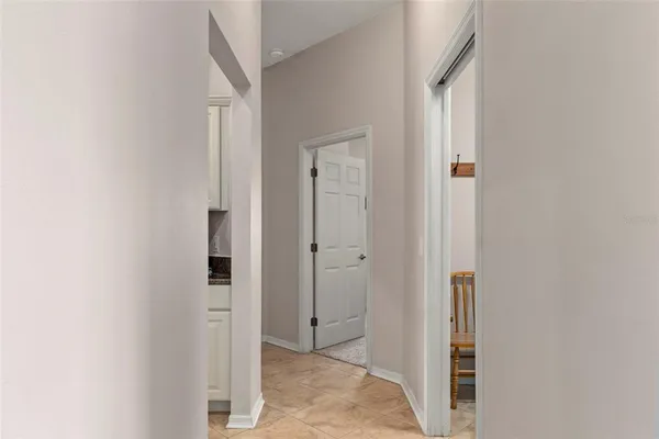 a view of a hallway with workspace
