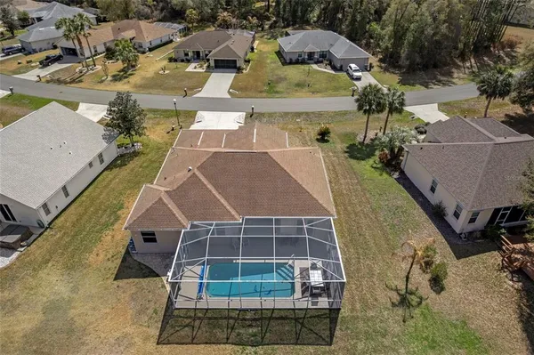 a view of a swimming pool with a patio