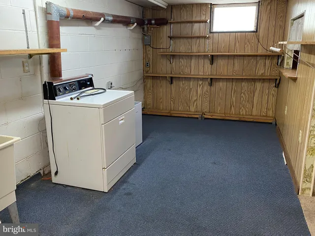 a view of utility room and utility room