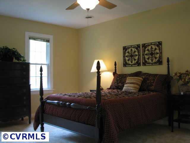 1001 Kingscross Road Midlothian, VA 23114 - Photo 7 of 10 Other - Master bedroom is roomy with new carpet, ceiling fan and fresh paint plus a full bath.