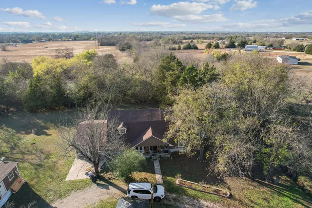 a view of a lake from a yard
