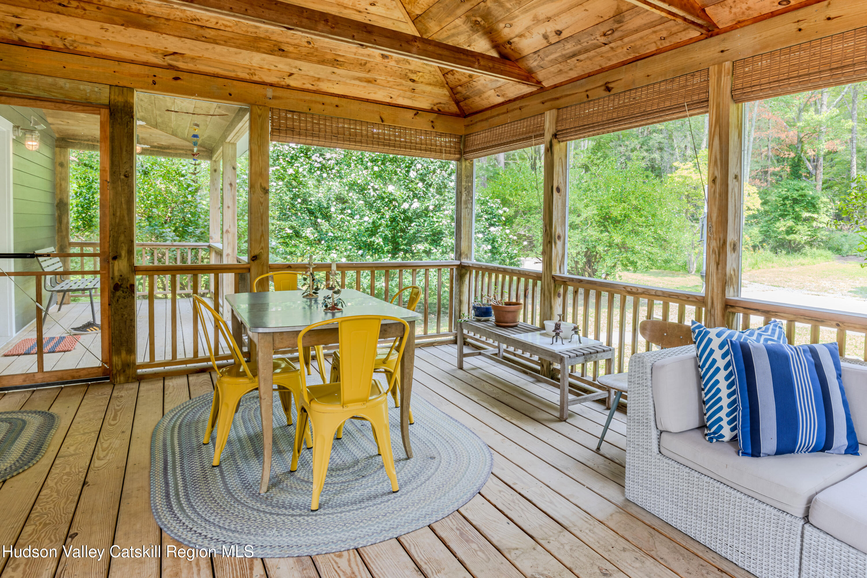 15 Bakertown Road, Unit EASEMENT OFF BAKERTOWN Accord, NY 12404 - Photo 13 of 22 a view of a balcony with chairs and wooden floor