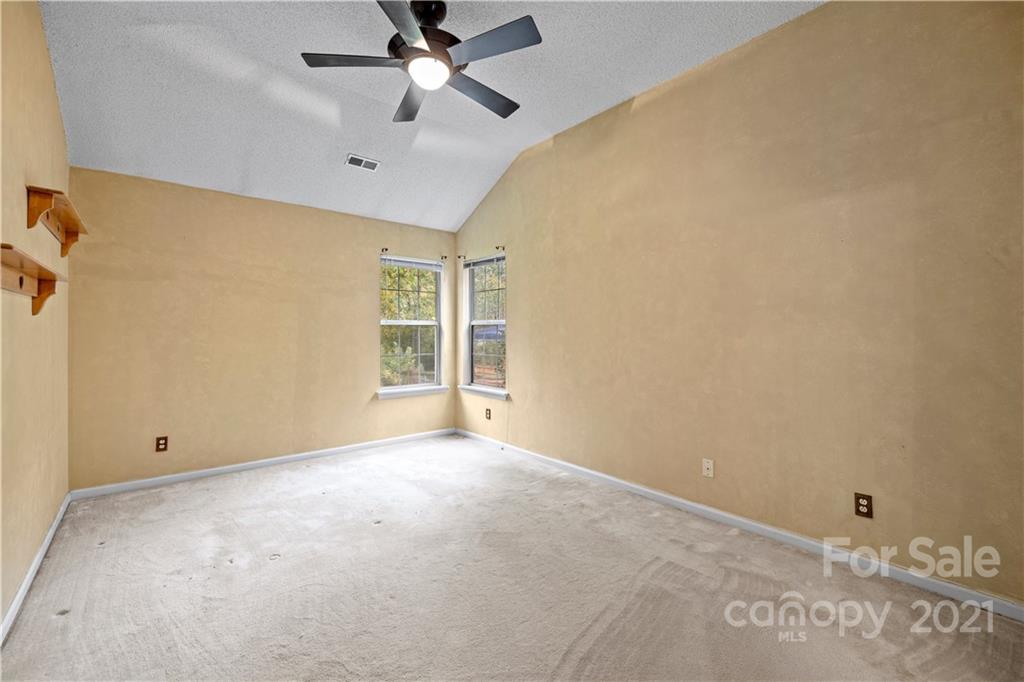 11232 Clayford Ridge Charlotte, NC 28215 - Photo 11 of 22 a view of an empty room with a window