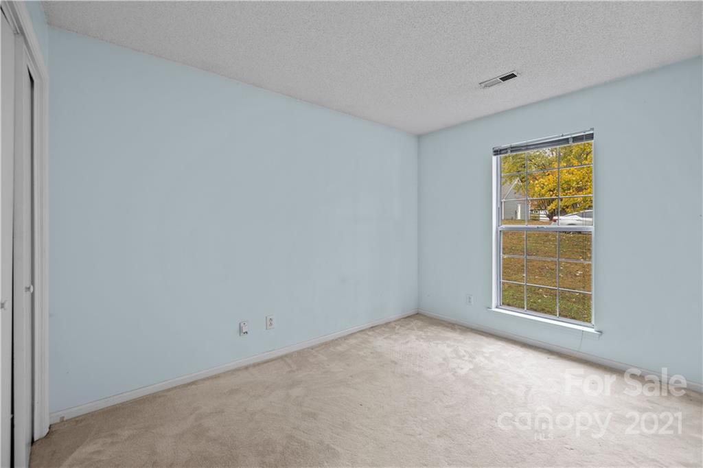 11232 Clayford Ridge Charlotte, NC 28215 - Photo 14 of 22 a view of an empty room with a window
