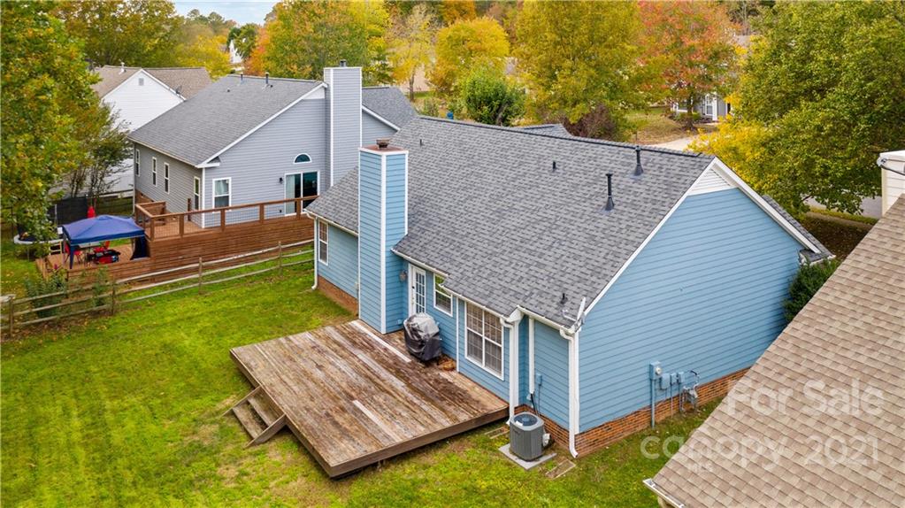 11232 Clayford Ridge Charlotte, NC 28215 - Photo 18 of 22 a aerial view of a house with a yard balcony and a slide