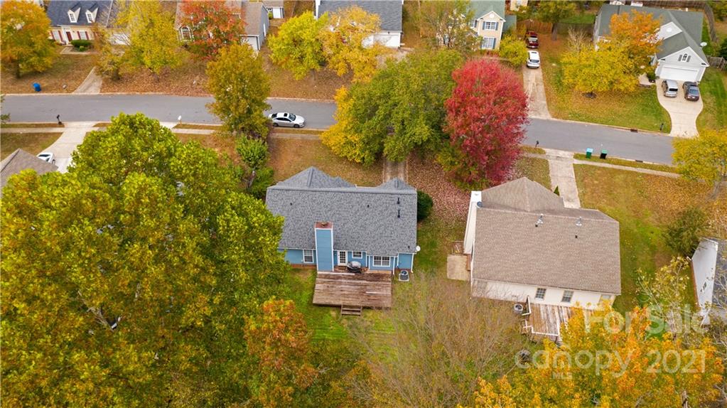 11232 Clayford Ridge Charlotte, NC 28215 - Photo 21 of 22 an aerial view of residential houses with swimming pool