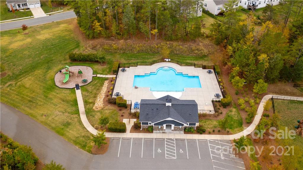 11232 Clayford Ridge Charlotte, NC 28215 - Photo 22 of 22 an aerial view of a house with swimming pool