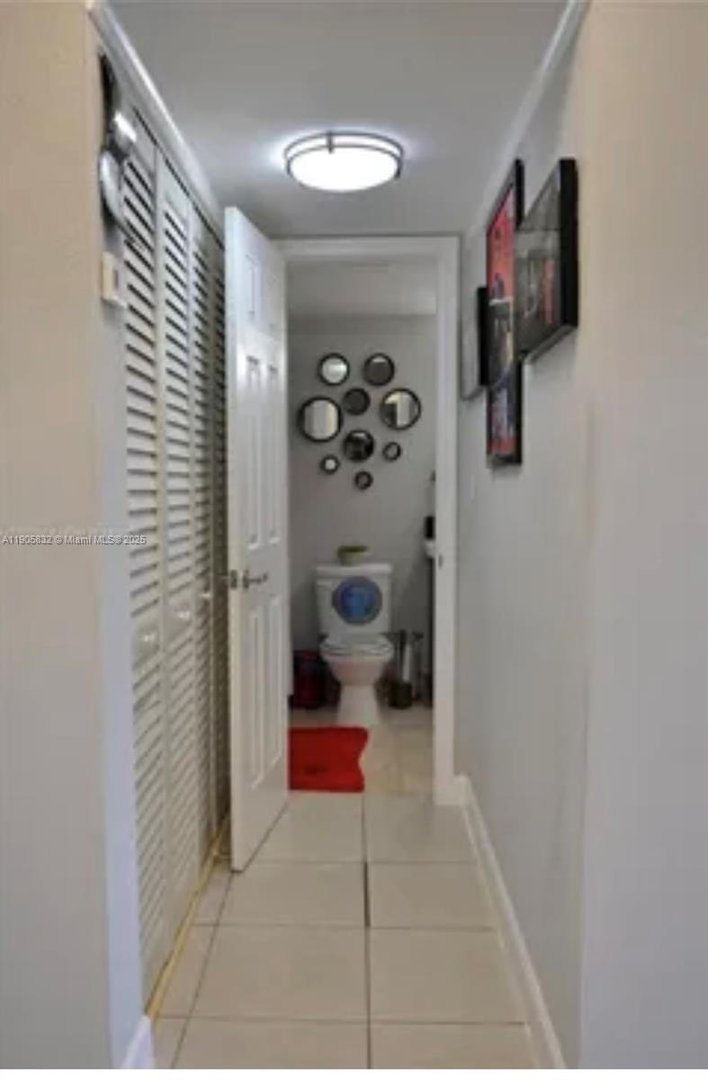 10900 Southwest 104th Street, Unit 314 Miami, FL 33176 - Photo 11 of 13 a bedroom with a bed and a shower