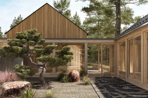 a house view with a backyard space