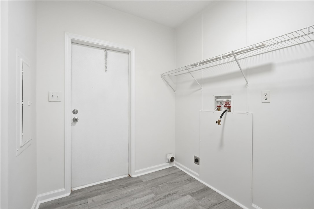 112 Sir Francis Drake Way Liberty, SC 29657 - Photo 18 of 42 This dedicated laundry space features practical amenities and durable flooring for everyday tasks.