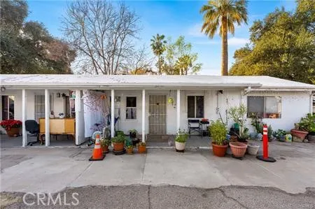 front view of a house with a patio