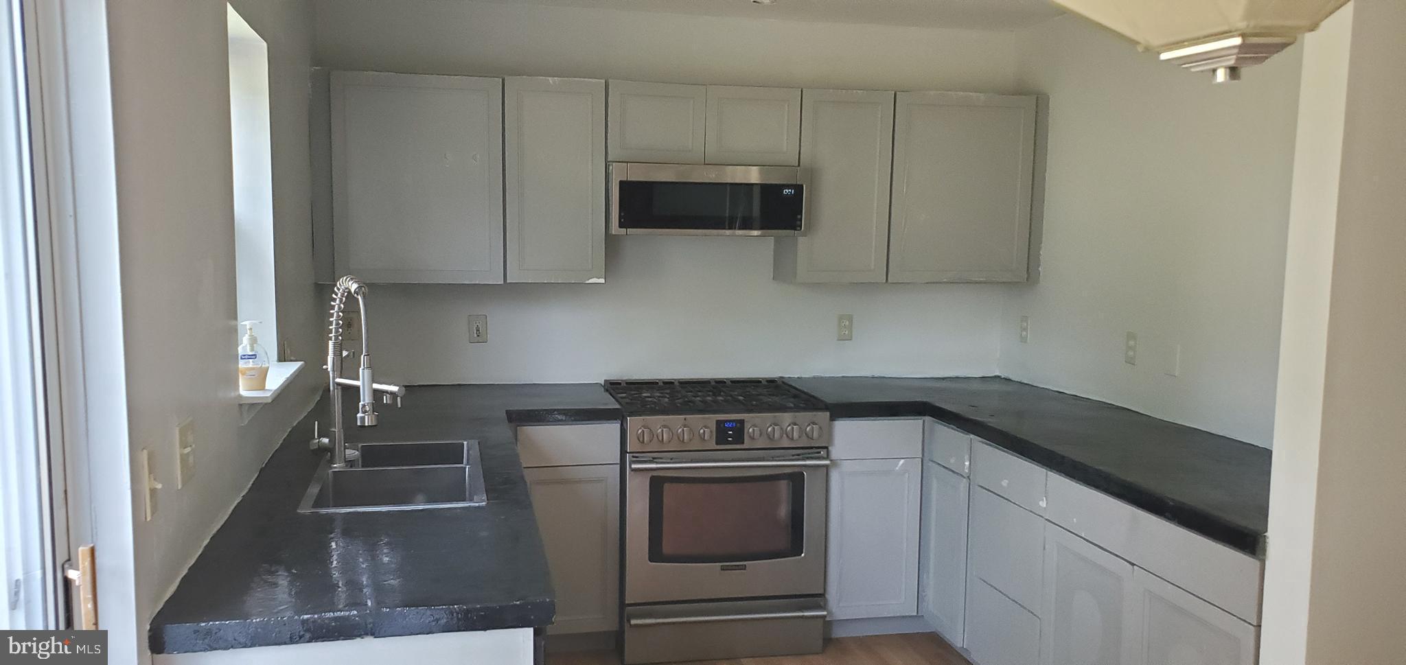 9627 Mendoza Road Randallstown, MD 21133 - Photo 8 of 42 New cabinets! Stainless steel appliances.