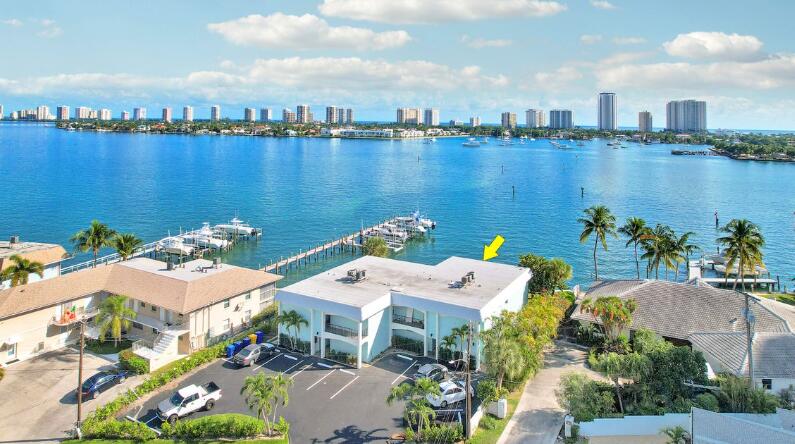 360 Wilma Circle, Unit 5 Riviera Beach, FL 33404 - Photo 3 of 16 aerial view of a house with outdoor space and lake view