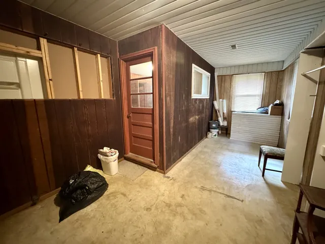 a view of livingroom with furniture and closet