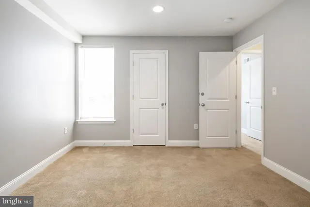a view of hallway with stairs
