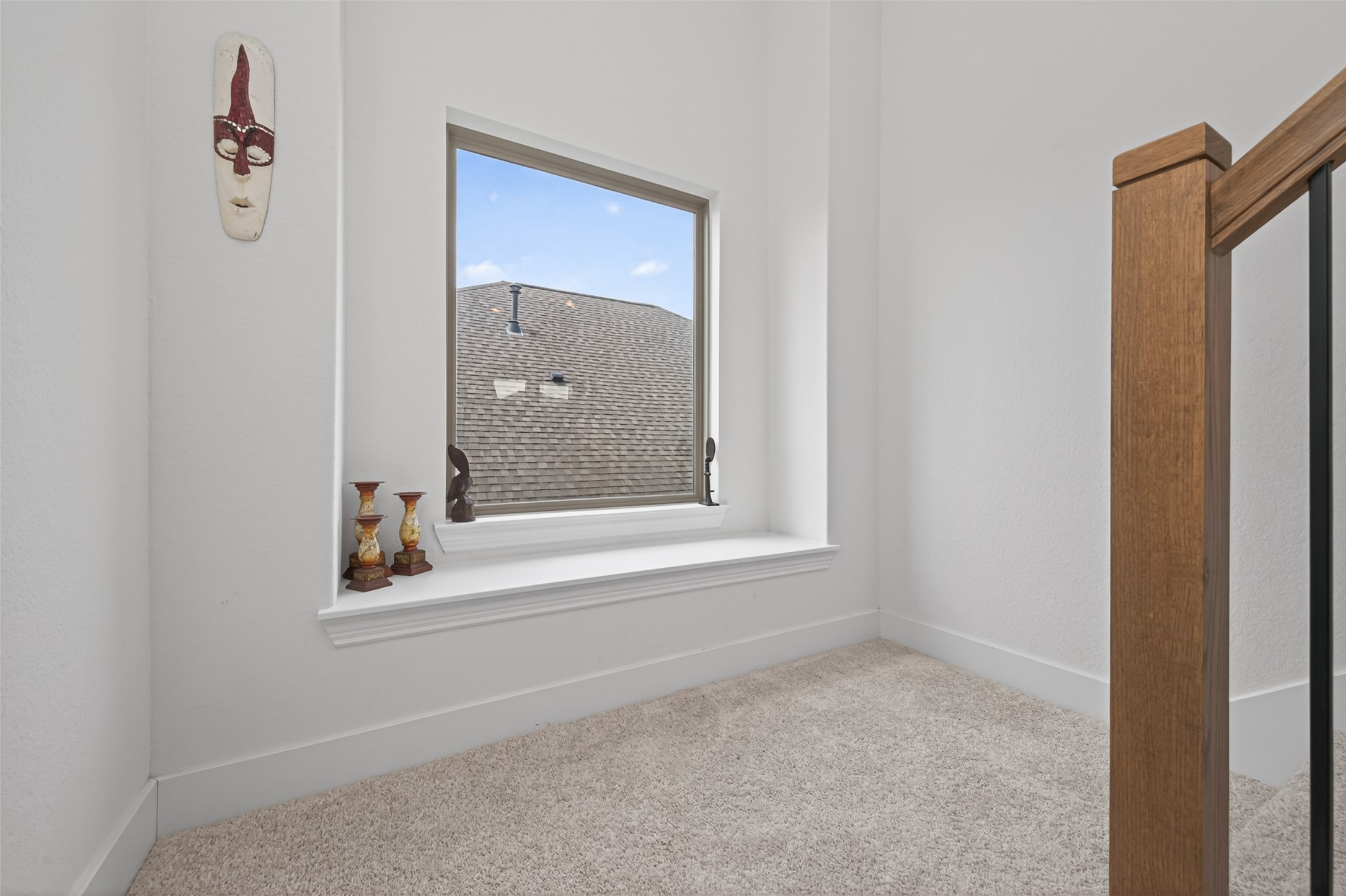 20802 Mirror Point Drive Cypress, TX 77433 - Photo 20 of 37 This cozy nook offers a warm and inviting ambiance, highlighted by a generous window that floods the space with natural light, complemented by the luxurious feel of plush carpeting.