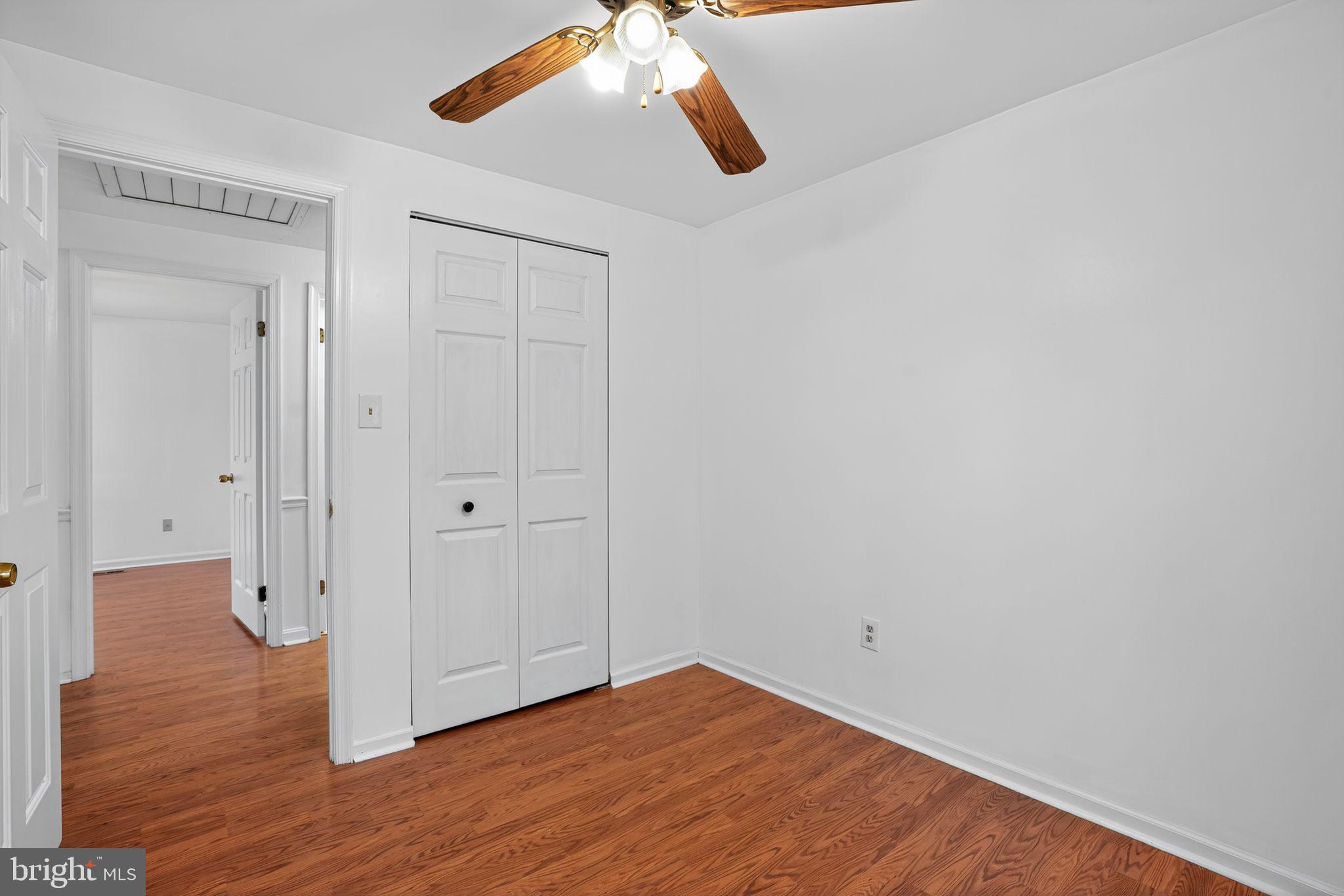 1513 Rainbow Drive Silver Spring, MD 20905 - Photo 23 of 58 a view of a room with wooden floor